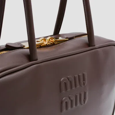 Miu Miu Dark Brown Leather Top Handle Bag In Brown