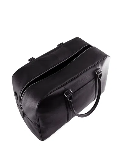 Le Tanneur Charles Travel Duffle In Pebbled Leather In Black