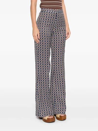 Sandro Floral-pattern Trousers In Multi
