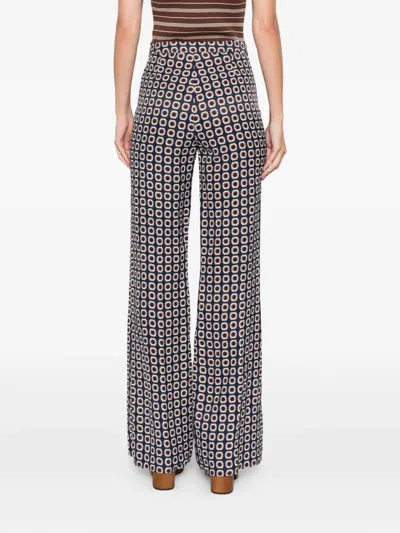 Sandro Floral-pattern Trousers In Multi