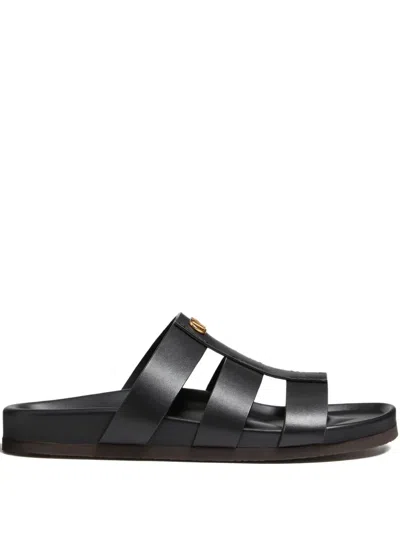 Valentino Garavani Studshield Logo-embellished Leather Sandals In Black