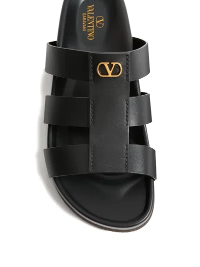 Valentino Garavani Studshield Logo-embellished Leather Sandals In Black