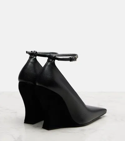 Alaïa 110 Leather Wedges In Black