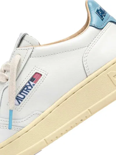 Autry Medalist Low Sneakers In White And Light Blue Leather In White