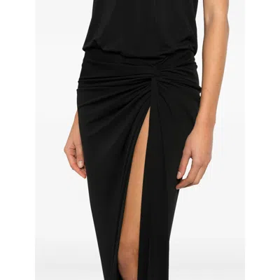 The Andamane Dresses In Black