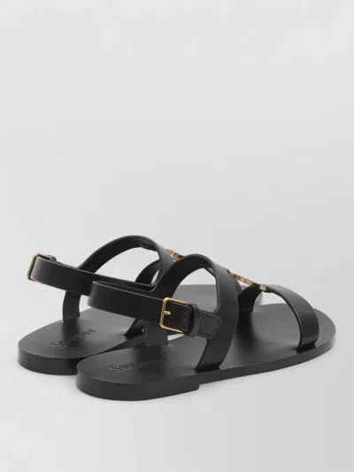 Saint Laurent Cassandra Logo Plaque Flat Sandals In Black