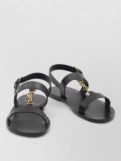 Saint Laurent Cassandra Logo Plaque Flat Sandals In Black