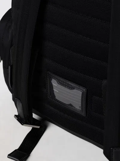 Dolce & Gabbana Sleek Black Backpack With Prominent White Logo Print In Black