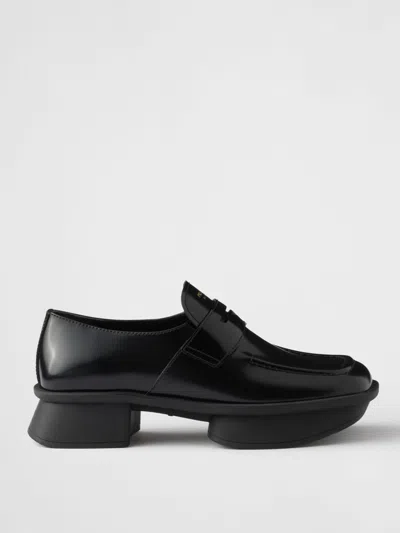 Prada Re-edition 1999 Equal Platform Penny Loafer In Animal Print