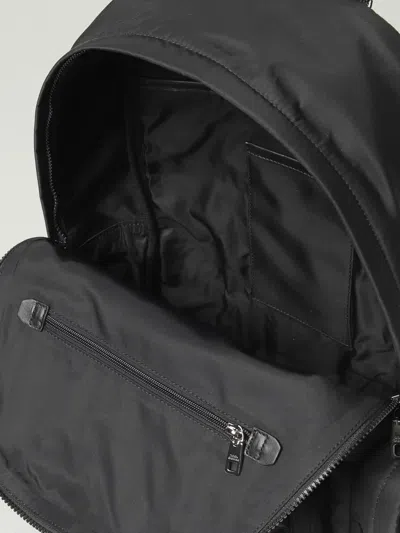 Dolce & Gabbana Sleek Black Backpack With Prominent White Logo Print In Black