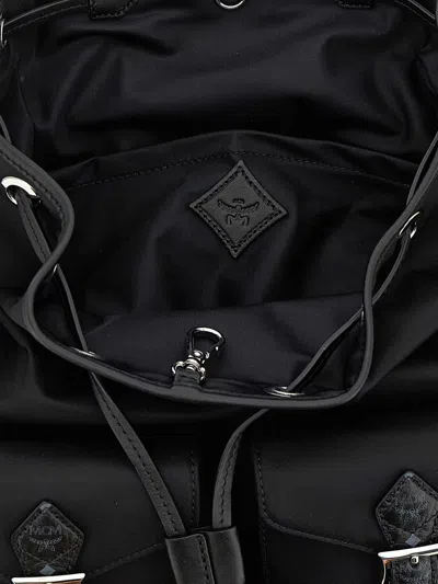 Mcm Small Aren Drawstring Backpack In Econyl And Leather In Black
