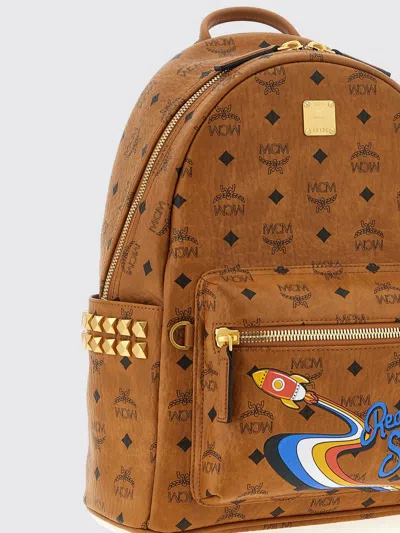Mcm Small Medium Backpack With Front Pocket And Straps In Brown