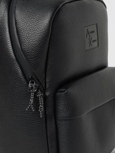 Armani Exchange Logo Embossed Backpack In Black