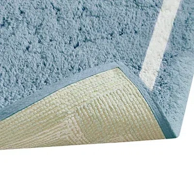 Kirkland's Simple Trim Cotton Tufted Bath Mat In Blue