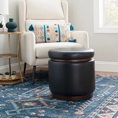 Kirkland's Round Black Faux Leather Storage Ottoman In Black