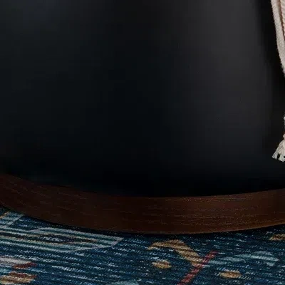 Kirkland's Round Black Faux Leather Storage Ottoman In Black