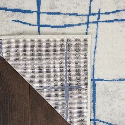 Kirkland's Abstract Linear Area Rug In Blue