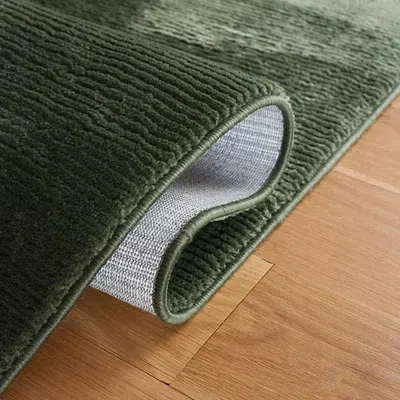Kirkland's Solid Green Revive Area Rug In Green