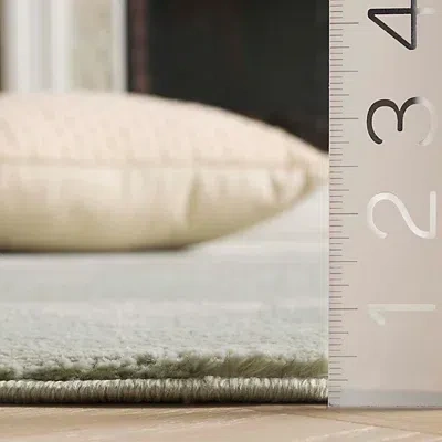 Kirkland's Solid Sage Green Revive Area Rug In Green