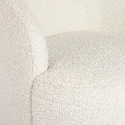 Kirkland's Small Round Cream Boucle Swivel Accent Chair In White