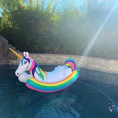 Kirkland's Rainbow Unicorn Rocker Pool Float In White