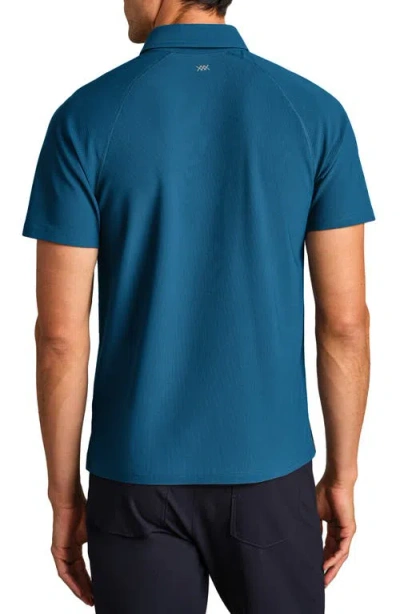 Rhone Regatta Piqué Performance Polo In Blue