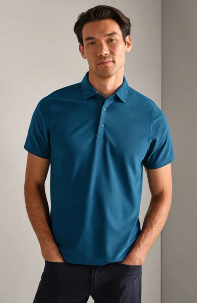 Rhone Regatta Piqué Performance Polo In Blue