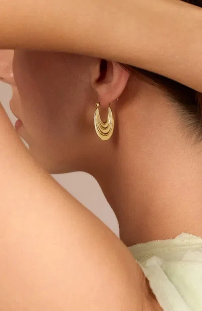 Athra Luxe Long Textured Hoop Earrings In Gold