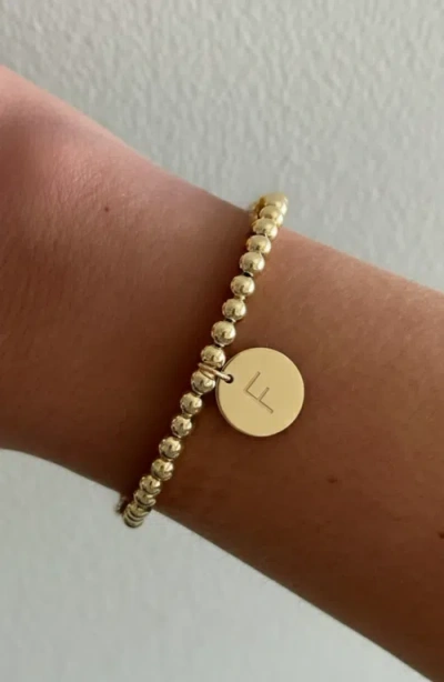 Cuffed By Nano Classic Initial Coin 14k Gold Filled Bead Bracelet In Gold