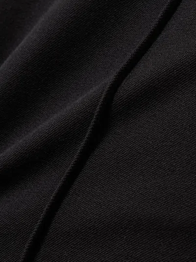 Frame Crop Kick Flare Stretch-cotton Pants In Black