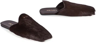 Prada Fur Leather Mules In Brown