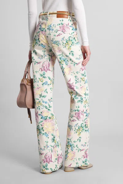 Chloé Women Flare Denim Jeans With All-over Flowers Print In Multi