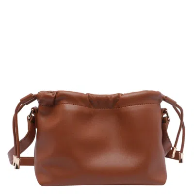 Apc A.p.c. Ninon Logo Embossed Mini Shoulder Bag In Brown