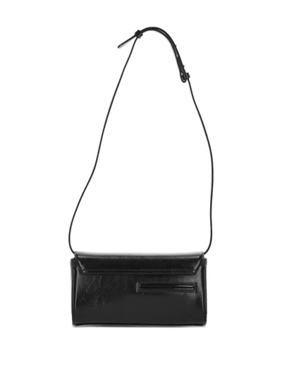 Stand Oil Butter Adjustable-strap Clutch Bag In Black