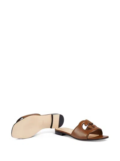 Gucci Interlocking G Cutout Leather Sandal In Brown