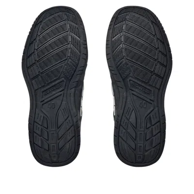 Balenciaga Hamptons Worn-out Low-top Leather Sneakers In Black