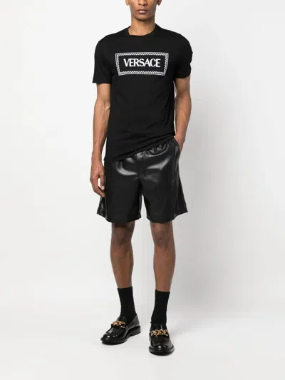 Versace Black Crewneck T-shirt With Contrasting Logo Lettering Print In Cotton
