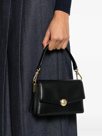 Lacoste Turn-lock Strap Mini Bag In Black