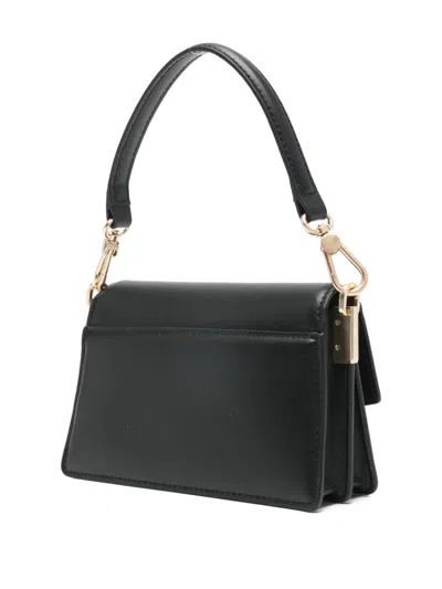 Lacoste Turn-lock Strap Mini Bag In Black