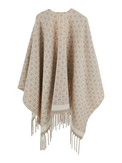 Ferragamo Beige Crewneck Cape With Fringed Hem And All-over Gancini Embroidery In Wool Woman In Nude