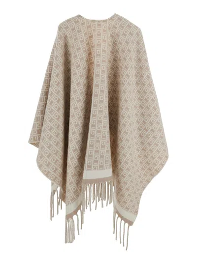 Ferragamo Beige Crewneck Cape With Fringed Hem And All-over Gancini Embroidery In Wool Woman In Gold