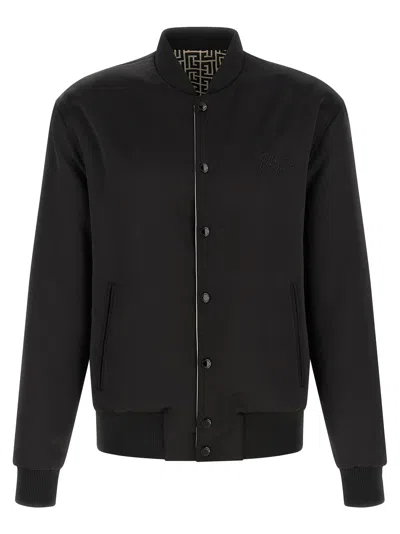 Balmain Monogram Reversible Bomber Jacket In Black