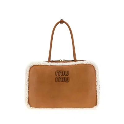 Miu Miu Camel Leather Beau Handbag In Brown