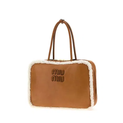 Miu Miu Camel Leather Beau Handbag In Brown