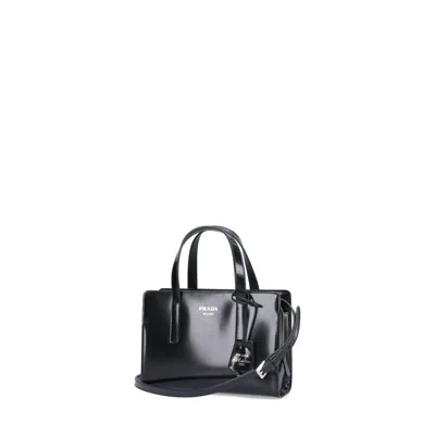 Prada Logo Patent Leather Tote In Black
