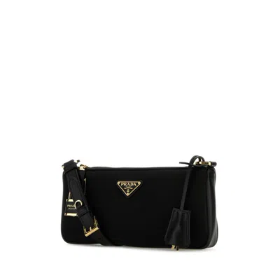 Prada Small Re-nylon And Leather Shoulder Bag With Padlock In Black