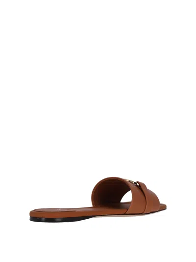 Ferragamo Leather Flat Sandals With Logo In Brown