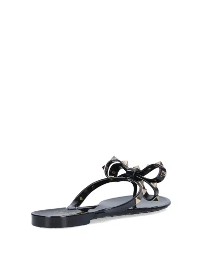 Valentino Garavani Mini Bow Sandals With Platinum-finish Studs In Black