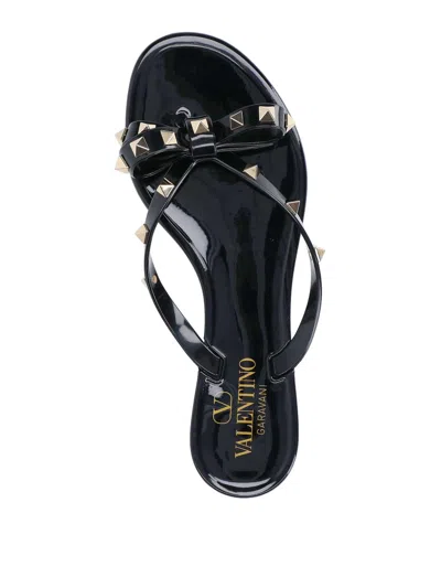 Valentino Garavani Mini Bow Sandals With Platinum-finish Studs In Black