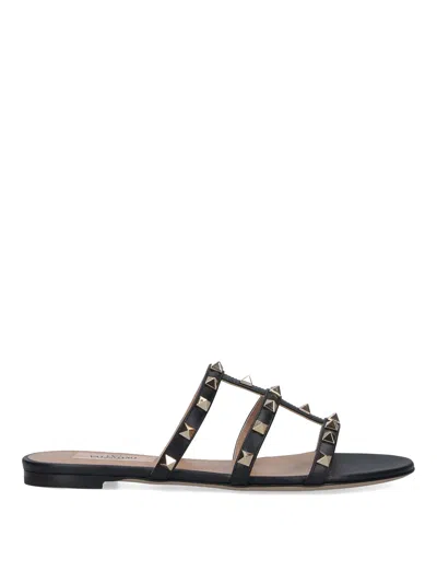 Valentino Rockstud Slide Sandal In Laminated Nappa With Cabochon In Black